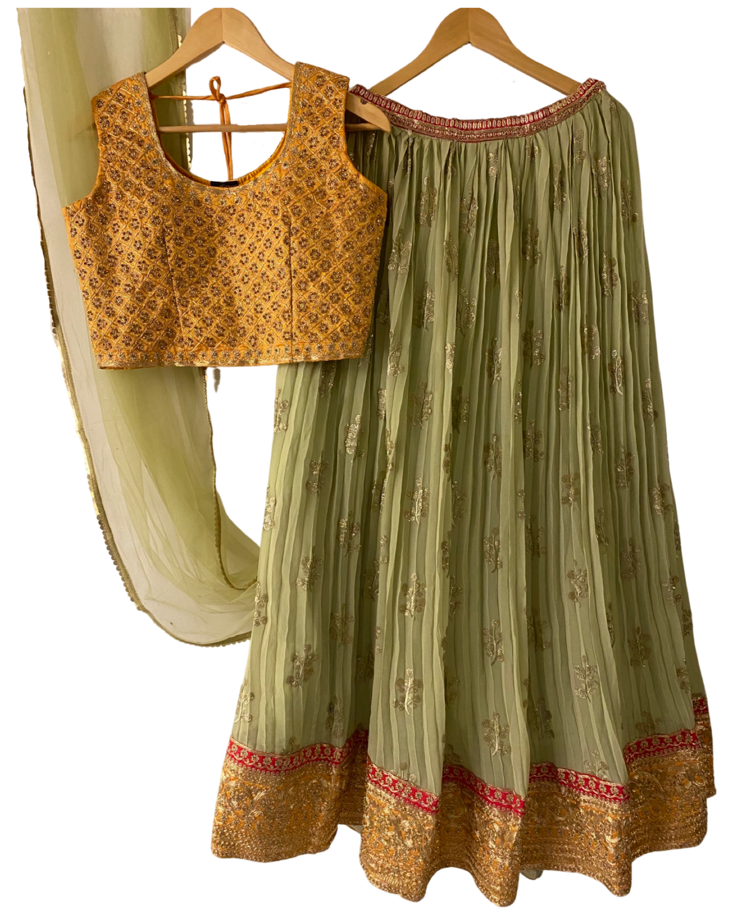 CHIFFON YELLOW CROP TOP WITH LEHENGA IN PISTA GREEN